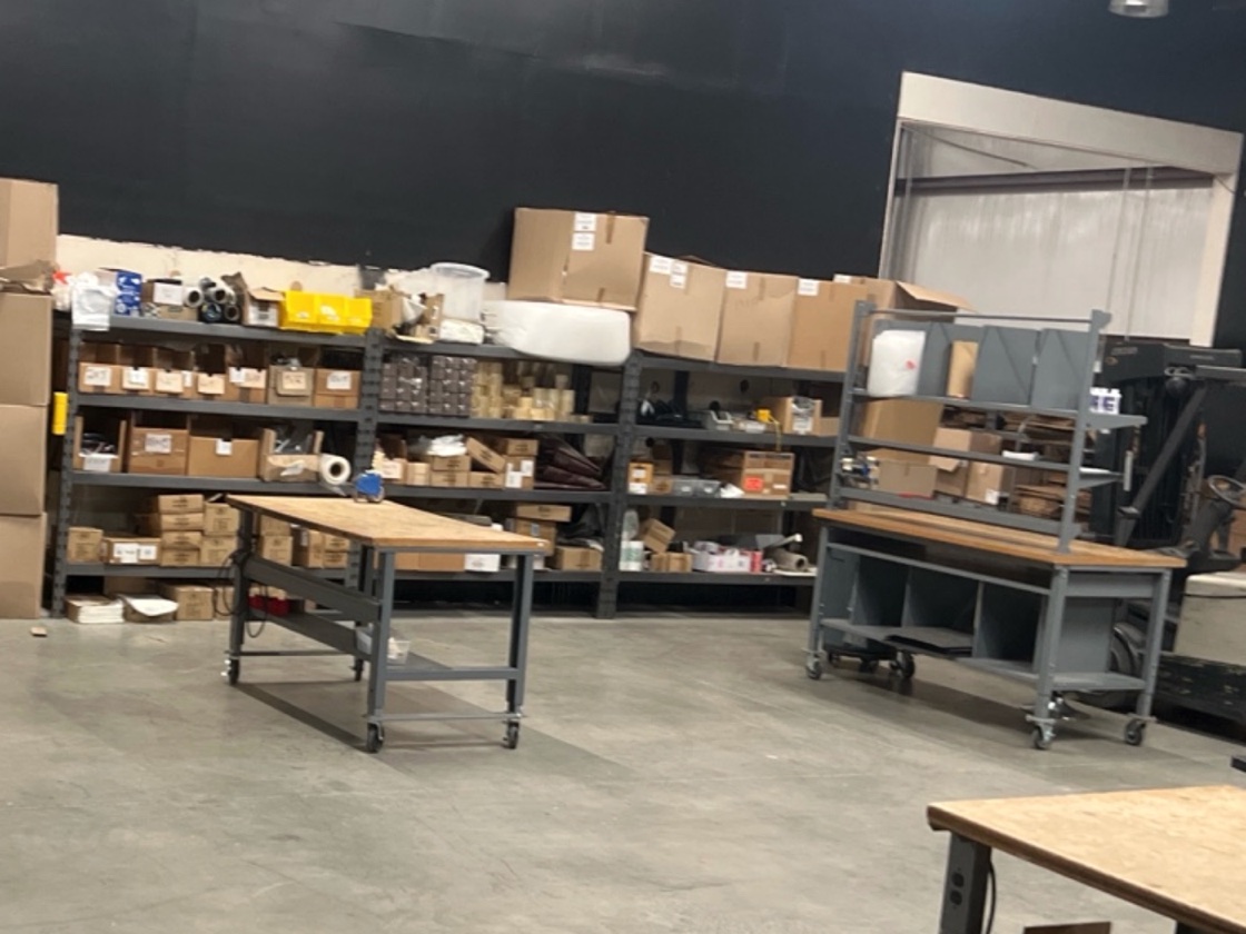Pack benches and parts shelving on the Marketplace Prep floor in Fort Worth, Texas